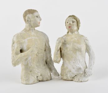 white-tanish figures