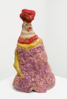 figure with red/orange hair and purple clothing
