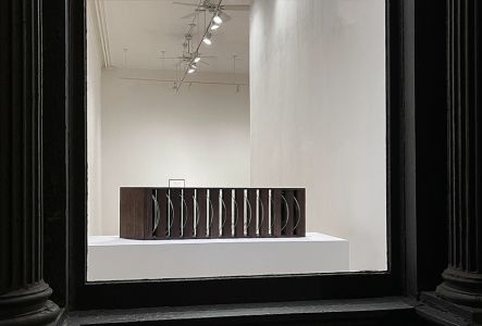 large window with horizontal sculpture