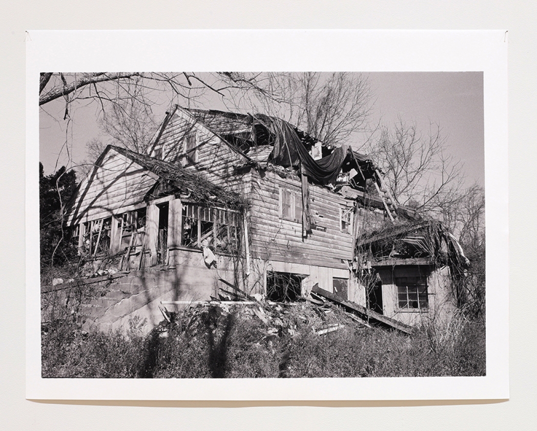 black and white photo of wrecked house
