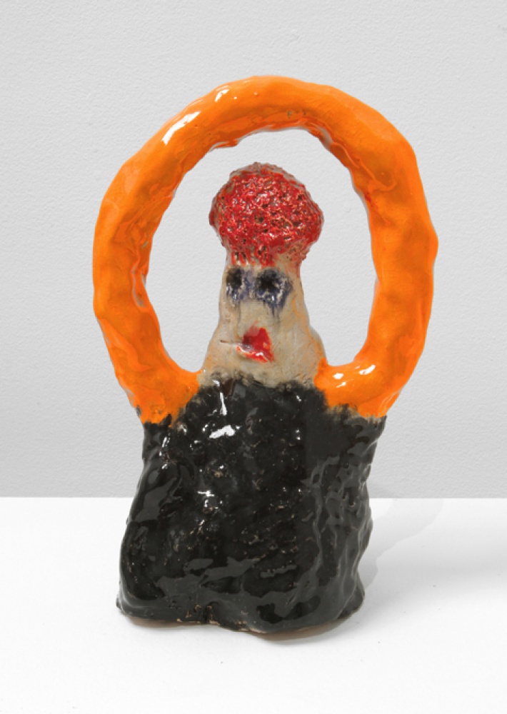 figure with orange circle