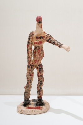 ceramic figure with red hair
