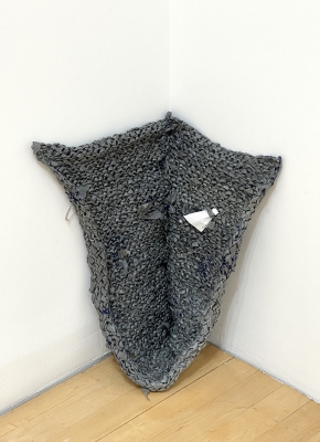 gray woven corner sculpture 