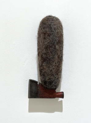 small axe with brown felt sculpture
