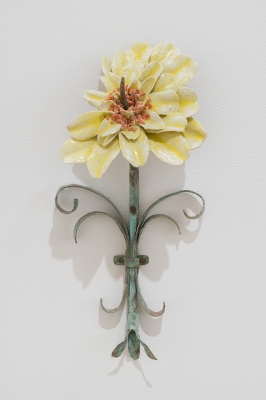 Yellow flower on stem
