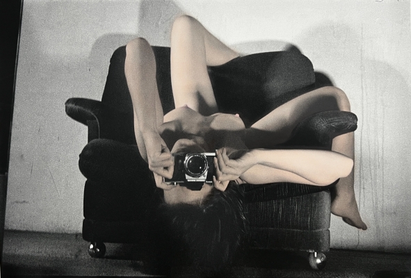 Janice Guy self-portrait with chair and camera