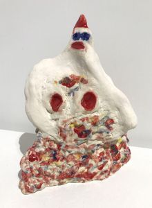 figure with red breasts